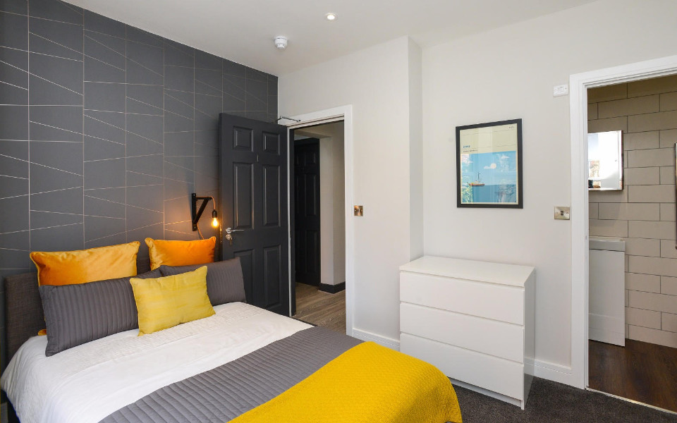 Refurbs & Renovations - Bedroom White Orange Sheets